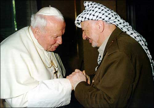 Pope John Paul II received Palestinian Authority President Yasser Arafat during an audience at Castel Gandolfo, located near Rome.