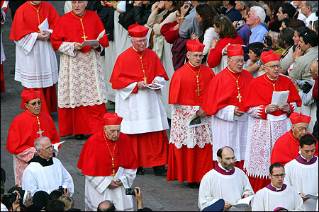 Cardinals led the procession Monday as the body of Pope John Paul II was carried to St. Peter’s Basilica. They have not yet set a date for the start of a conclave to elect a successor.