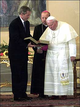 President Bush presented a gift to Pope John Paul II during their meeting at the papal summer residence, Castel Gandolfo. The gift was an 1849 first-edition anthology of American poems.