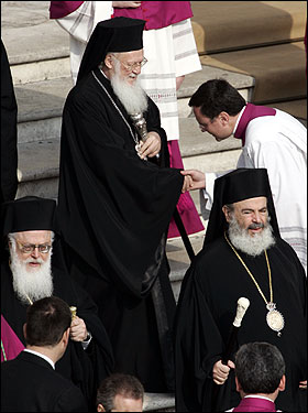 Ecumenical Patriarch Bartholomew I ( top), spiritual leader of the world's Christian Orthodox, and Greece's Archibishop Christodoulos (right) attended the funeral for Pope John Paul II in St. Peter's Square.