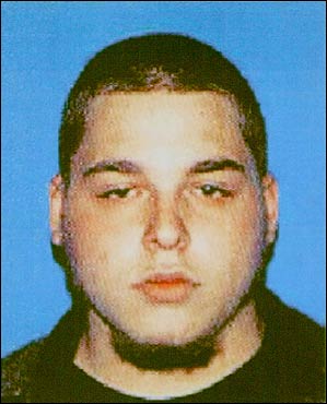 This photo released by the New Bedford Police Department shows Jacob D. Robida, 18, of New Bedford. Robida, wanted inlast week's hatchet-and-gun attack in a New Bedford gay bar, shot and killed a woman riding in his car and an Arkansas police officer before he was shot twice in the head in a gun battle with police Saturday.
