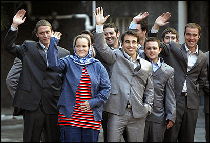 British sailors and marines waved for the cameras in Tehran yesterday after President Mahmoud Ahmadinejad said they could go free as a gift to the British people. The 15 Britons, whose capture in the Persian Gulf nearly two weeks ago raised tensions in the volatile region, boarded a commercial flight to London this morning. British sailors and marines waved for the cameras in Tehran yesterday after President Mahmoud Ahmadinejad said they could go free as a gift to the British people. The 15 Britons, whose capture in the Persian Gulf nearly two weeks ago raised tensions in the volatile region, boarded a commercial flight to London this morning.