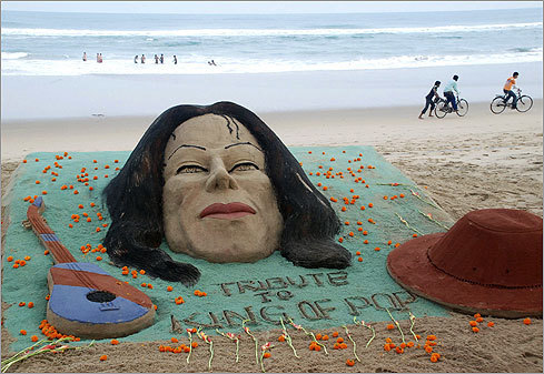 At a beach in Puri, India, Sudarshan Pattnaik made a sand sculpture in tribute to Jackson on June 26.