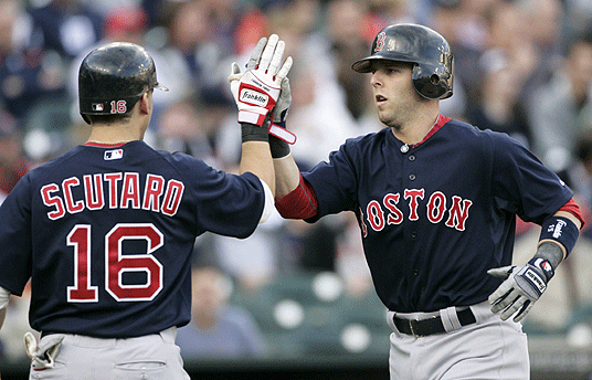 Dustin Pedroia joined David Ortiz in first-inning homers. He was congratulated by Marco Scutaro.