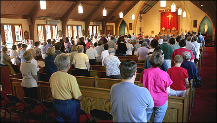 The congregation gathers at St. Albert the Great in Weymouth for a lay prayer service last weekend; the final Mass at the church was held Aug. 29.