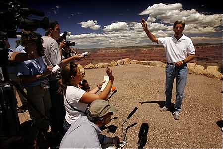 Senator John F. Kerry waved to a group of photographers at the rim of the Grand Canyon on Aug. 9.