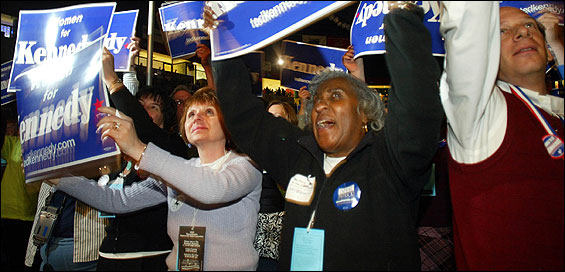 Delegates Ellen Herling (L) and Ellie Mayers cheered as US Senator Edward M. Kennedy addressed the Massachusetts Democratic Party Convention yesterday in Paul E. Tsongas Arena in Lowell. The delegates voted to endorse gay marriage in their party platform. From left, Thomas F. Reilly, Kennedy, Deval Patrick, and Howard Dean spoke at the convention.