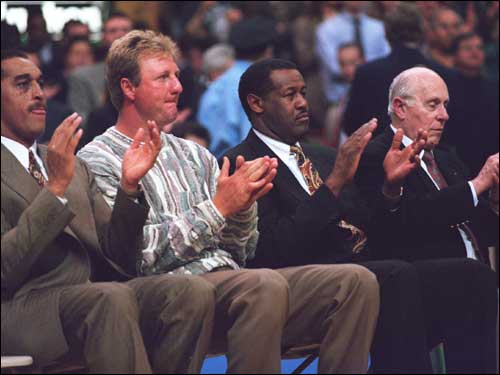 Dennis Johnson, Larry Bird, M.L. Carr, and Auerbach (from left to right) pay tribute to Reggie Lewis on Reggie Lewis night in March 1995.