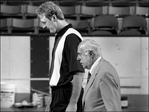 Auerbach and Larry Bird walked around the Boston Garden court in 1992 after Bird announced his plan to retire as a player.