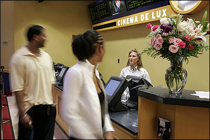 Nicole Englehart and her Cinema de Lux co-workers in Millbury offer personal service and high-end amenities.