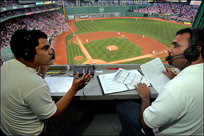 Uri Berenguer (left) and Juan Oscar Baez, at work in Fenway, continue the tradition at the Spanish Beisbol Network. Uri Berenguer (left) and Juan Oscar Baez, at work in Fenway, continue the tradition at the Spanish Beisbol Network.