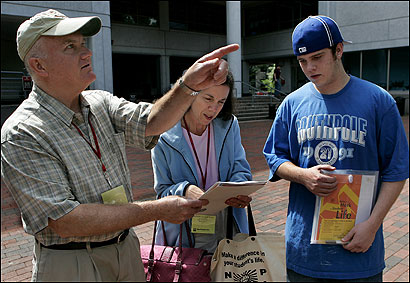 Bill Geary, his wife, Marianne, and their son, Mike, looked at a campus map during Northeastern University's student orientation.