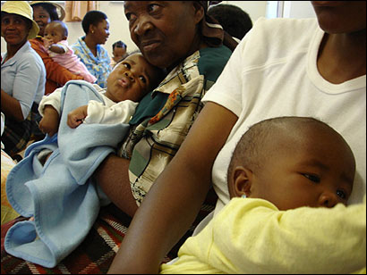 Relatives held babies in a waiting room at the government hospital in Butha-Buthe, Lesotho, where more than 60 percent of the people admitted test positive for HIV/AIDS.