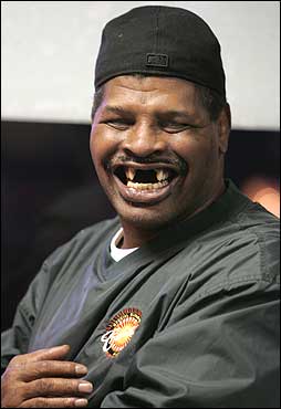 When he became the champion, Spinks—sporting his trademark toothless grin—was on the cover of Sports Illustrated. The smile looks the same today. ''No, I ain't no vampire,' he said with a laugh, noting that he first lost his teeth in 1972, when he was head-butted while sparring in the Marines.