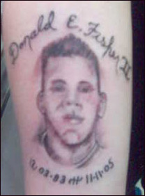 This tattoo of Donald E. Fisher II is on his mother's right forearm.