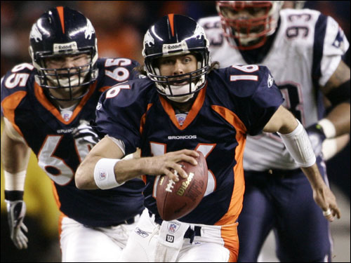 Broncos quarterback Jake Plummer scrambled for extra yardage.