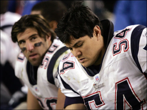 Tedy Bruschi, right, and Mike Vrabel, left, watched their season end.