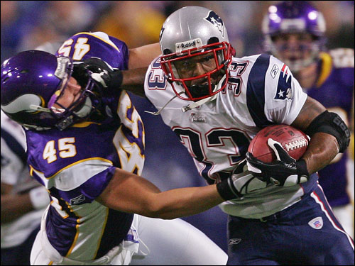 Kevin Faulk broke a tackle by the Vikings Richard Owens while returning a punt in the second half.
