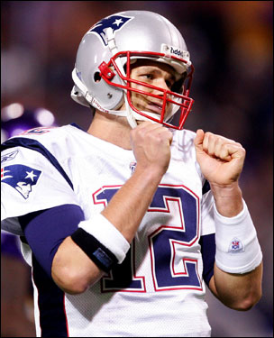 Tom Brady, who threw for four touchdowns in the game, reacted to an incomplete pass in the second quarter.