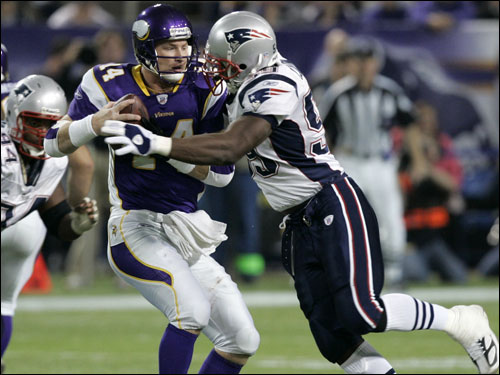 Patriots linebacker Rosevelt Colvin (right) tackled Minnesota Vikings quarterback Brad Johnson, who was able to get rid of the ball before falling.