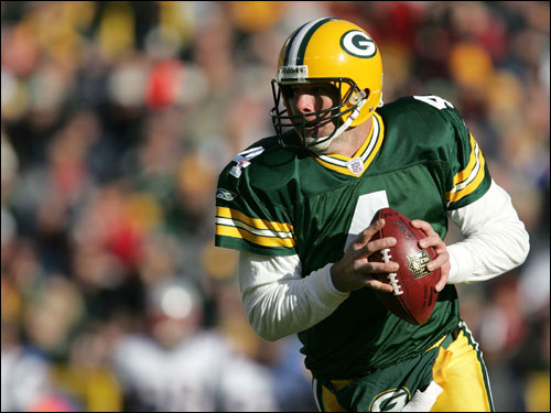 Brett Favre rolled out to look for a receiver against the Patriots.