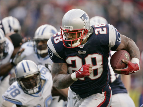 Patriots running back Corey Dillon (right) scored a touchdown against the Detroit Lions in the second quarter.