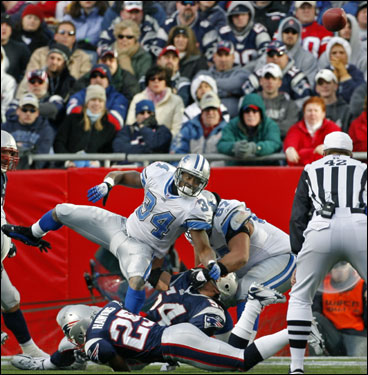 Patriots defensive back Artrell Hawkins knocked the ball high into the air for a fumble that was recovered by the Patriots.