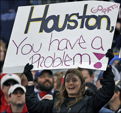 A Patriots fan held up a sign during the game.