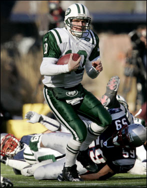 Chad Pennington (10) eluded New England's Rosevelt Colvin during the first quarter.