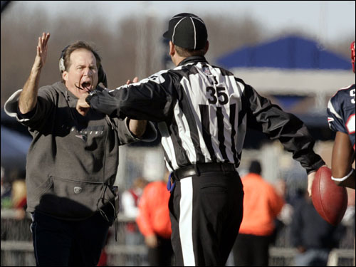 Patriots head coach Bill Belichick (left) yelled at an official for a timeout.