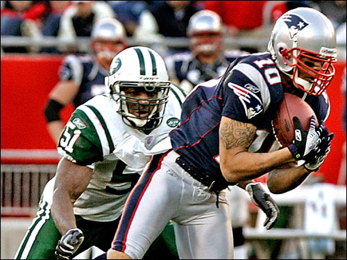 Jabar Gaffney (right) pulled in a catch on the Patriots' first drive.