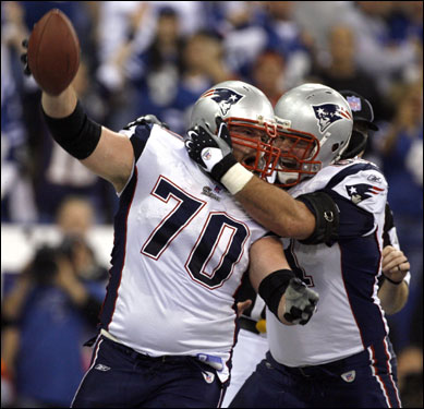 Logan Mankins (70) celebrated his fumble recovery for a touchdown with teammate Stephen Neal (61) to give the Patriots the early 7-0 lead.