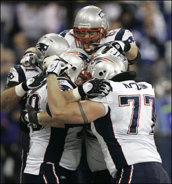 The Patriots' offensive line celebrated the team's first touchdown.