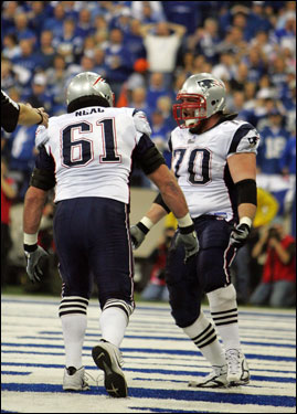 Logan Mankins (right) and teammate Stephen Neal celebrated Mankins' touchdown.