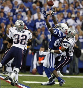 Colts wide receiver Reggie Wayne bobbled the ball after a reception, but regained possession to continue the Colts drive.