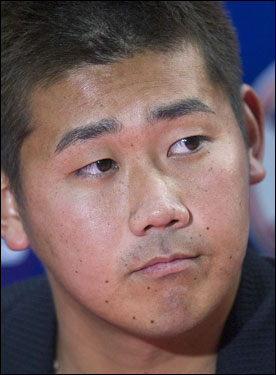 Matsuzaka listened to a question during his news conference.