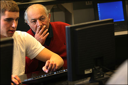 Joshua Noble (left) of Concord and Mohammad Moghimi in a Middlesex Community College computer network security class.