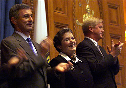 Martha Sosman, flanked by Paul Cellucci (left), then governor, and William Weld at her swearing-in ceremony for the
