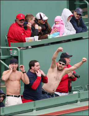 Despite the chilly temperatures, these fans had no problems shedding their shirts to support the Red Sox.