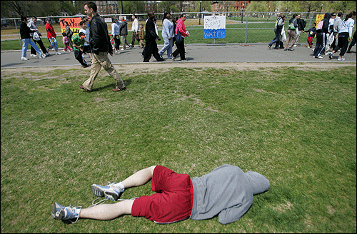 Dan McGowan sleeps on the Boston Common while his fellow participants finish the walk.