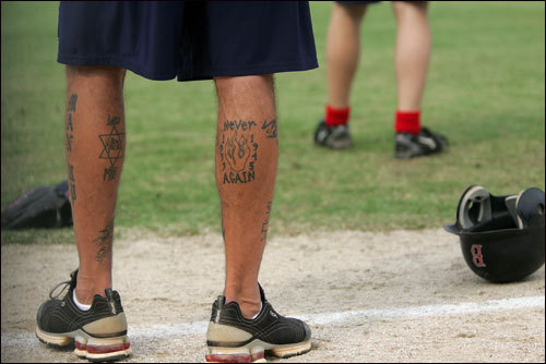 Kapler's legs are covered with tattoos that are reminders of his Jewish 