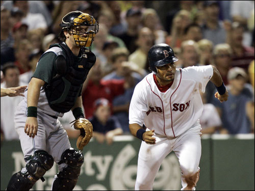There would be no extra innings, however. Jason Varitek roped a ground-rule double into the right-field grand stand with two outs and Coco Crisp, left, singled to right-center to plate the winning run.