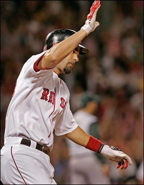 The Sox were two outs away from being blanked before Mike Lowell launched a solo shot into the Monster seats to tie the game.
