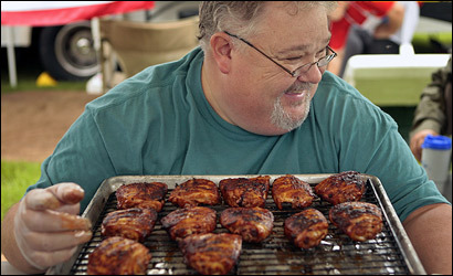 Ray Depot of the Anchormen Competition Barbecue Team of Narragansett, R.I., inspected his team's chicken entry before submitting it to judges during the Harpoon Championships of New England.
