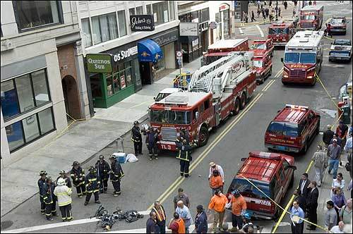 Emergency workers converged downtown Wednesday after a thick plume of steam spewed from a manhole after a steam pipe under a downtown Boston street apparently ruptured.