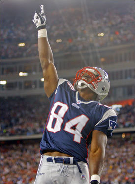 Patriots tight end Ben Watson pointed to the sky after his first-quarter touchdown.