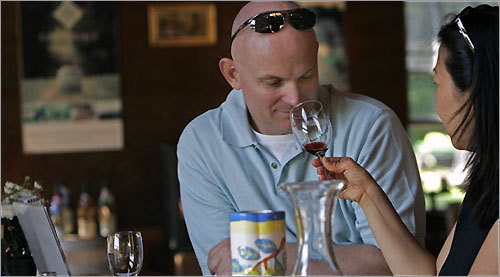 Scott Roache and Jamie Jun take in a wine tasting at Greenvale Vineyards.