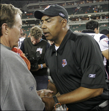 Bill Belichick, left, shook hands with Bengals coach Marvin Lewis following the game.