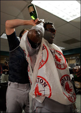 Ortiz celebrated with a Red Sox teammate.