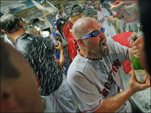 Youkilis wore protective goggles during the celebration.